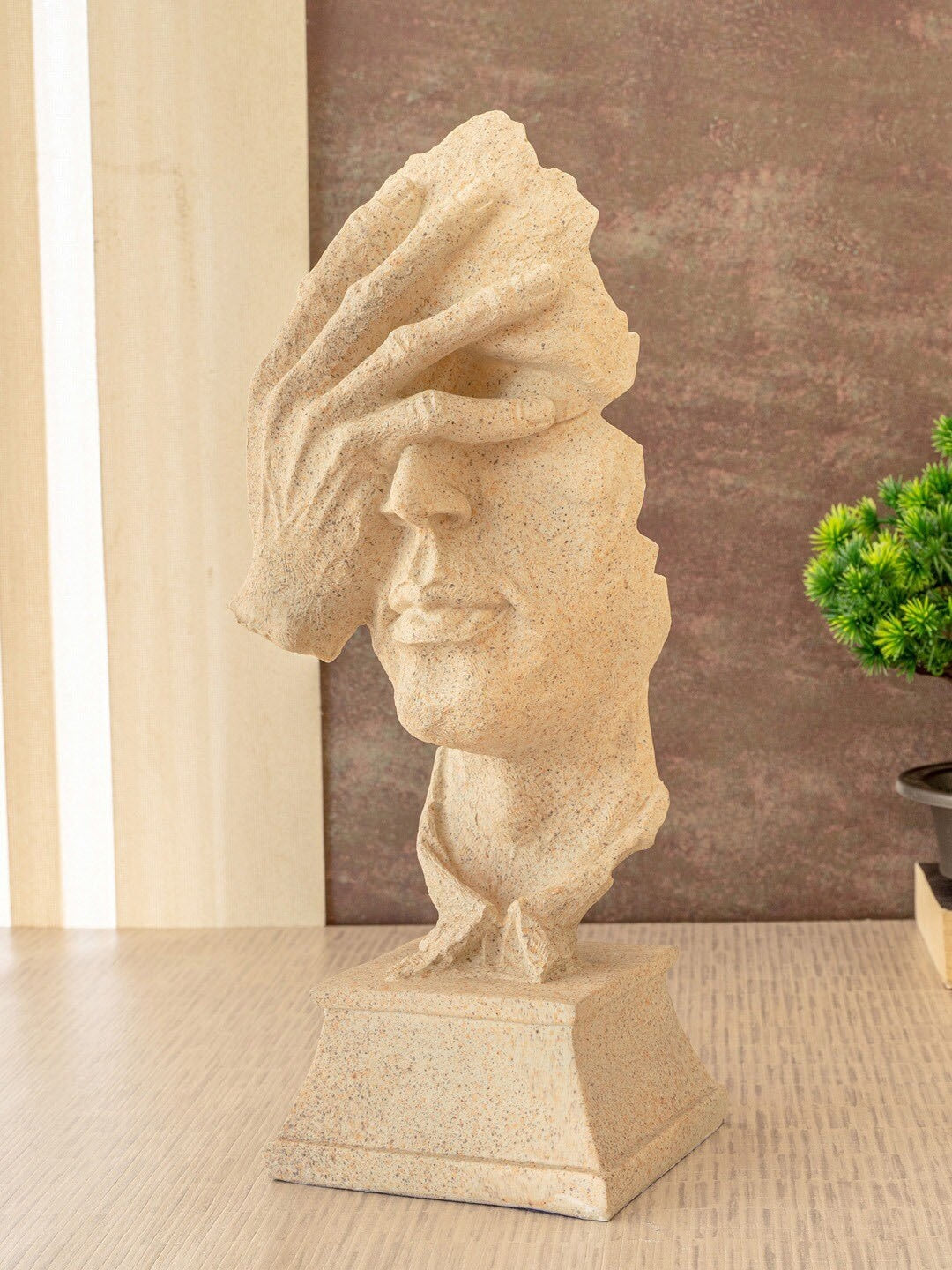 Beige Human Face Statue Figurine