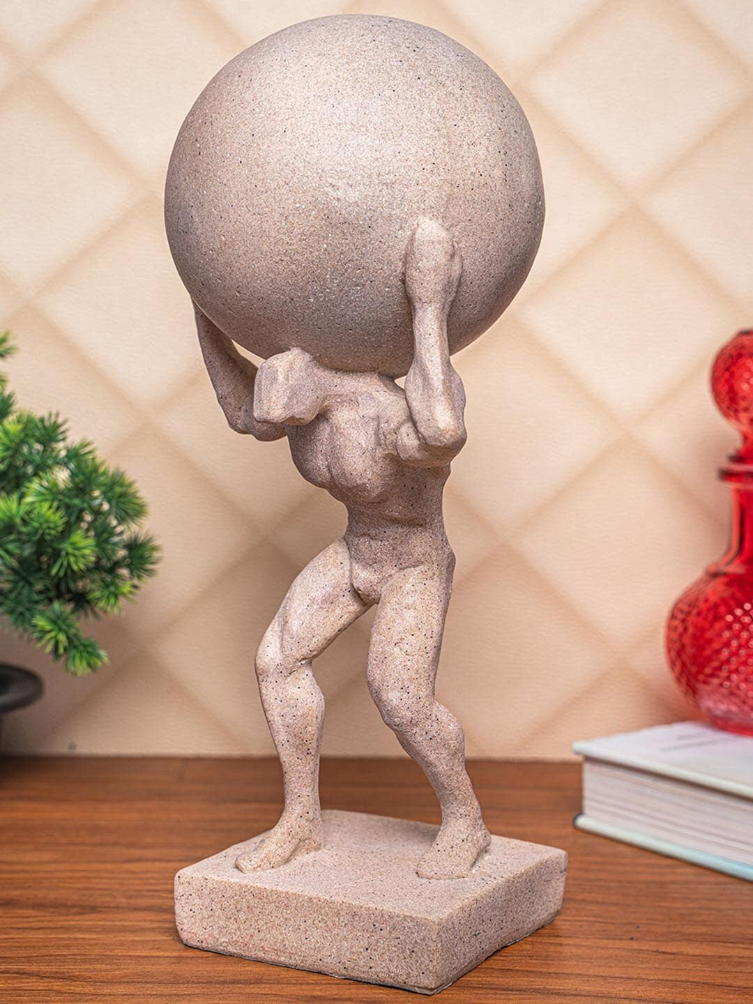 Man Carrying Earth Abstract Statue